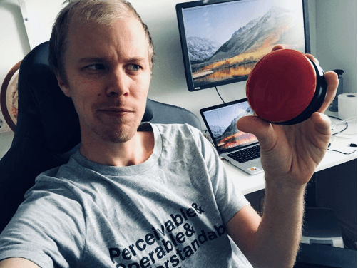 a man holding a switch